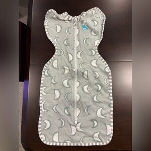 Love to Dream newborn arms up sleep sack swaddle newborn moon print green